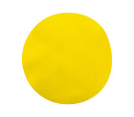 Yellow round plastic sticker label isolated on white background