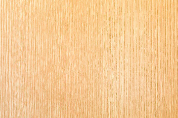 Texture of natural wood with a vertical natural pattern in yellow. Background for design