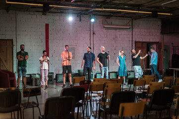 Naklejka premium Rehearsal at theatre. Actors preparing for role. Behind the scene