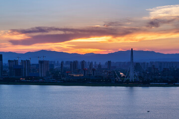 Naklejka premium sunset over the city in China