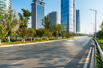 Naklejka premium Empty urban road and buildings in the city