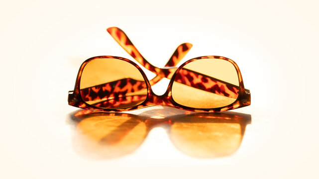 Sunglasses on near-white background