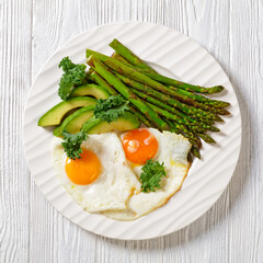 roast asparagus, ripe avocado and fried eggs