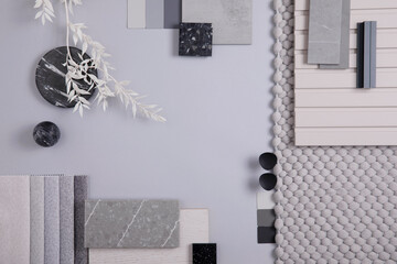Elegant  flat lay composition in grey color palette with textile and paint samples, lamella panels and tiles. Architect and interior designer moodboard. Top view. Copy space. - obrazy, fototapety, plakaty