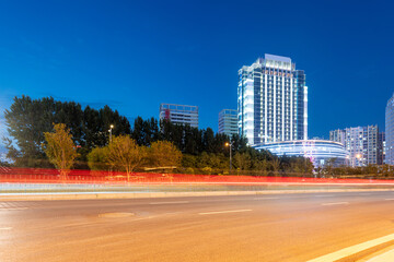 Obraz premium moving car with blur light through city at night