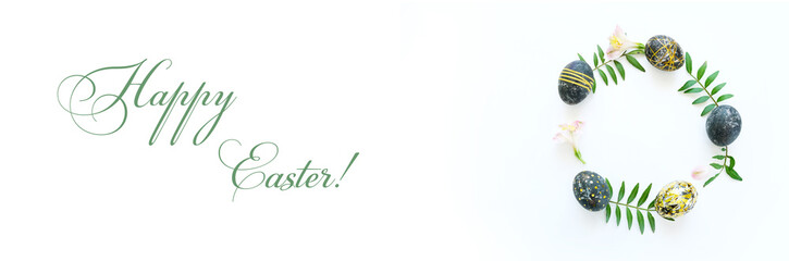 Black easter eggs with gold pattern on white