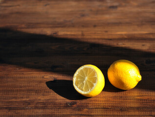 Sliced lemon lying on a wooden table