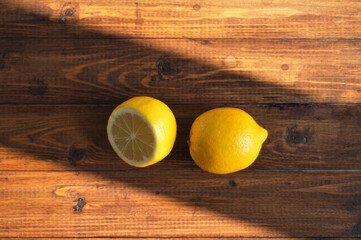 Sliced lemon lying on a wooden table
