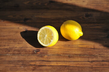 Sliced lemon lying on a wooden table