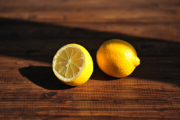 Sliced lemon lying on a wooden table