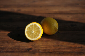Sliced lemon lying on a wooden table