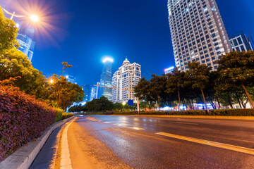 moving car with blur light through city at night