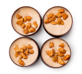 Delicious chocolate candy isolated on white, top view