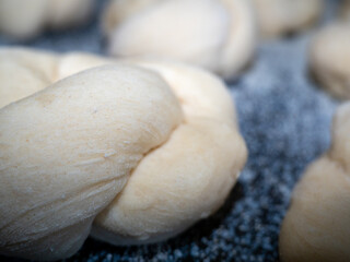 the process of making buns. Raw dough.
