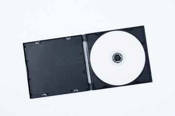 White CD in black plastic box. White background.