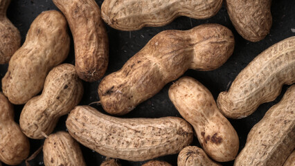 Composition of peanuts serving to make oil, peanut butter. Great for healthy and dietary nutrition. Concept of: condiments, dried fruit, food.