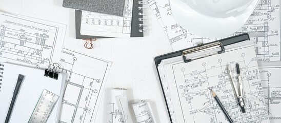 architect design working drawing sketch plans blueprints and making architectural construction...