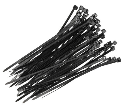 Black plastic cable ties isolated on white background. plastic wire ties closeup.