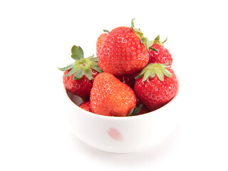 Fresh ripe strawberries in ceramic bowl ilated on white background. Japanese fruit