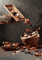 Falling dish with nuts and raisins.