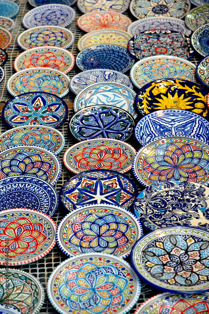 Wall mural traditional moroccan pottery and kitchenware on display for tourists