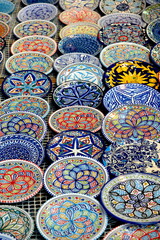 Traditional moroccan pottery and kitchenware on display for tourists