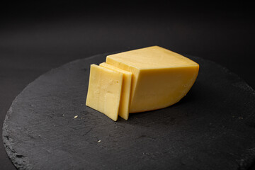Big piece of cheese on a plate