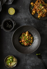 soba with mushrooms on a dark background