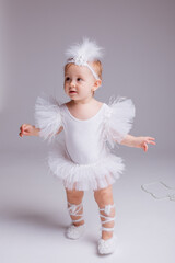 little baby ballerina on a white background