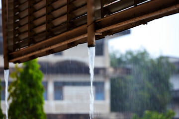 Close-up of water gushing out of the steel pipe