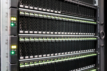 2.5 disk arrays in a data center cabinet 