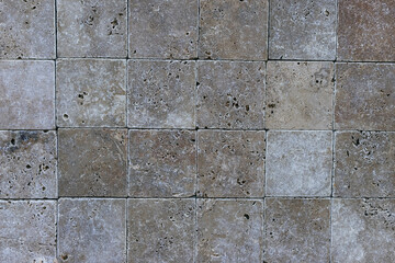 Laying paving slabs on the sidewalks in the city. Construction concept