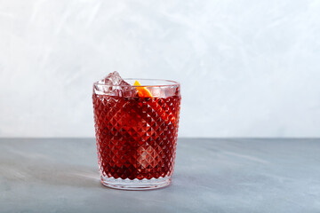 Americano Alcohol cocktail with red vermouth, bitter, soda water  and ice cubes