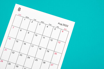 August 2022 calendar sheet on blue background.