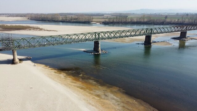 problems of drought and aridity in the almost waterless Po river with large expanses of sand and no water - climate change and global warming, Drone view in Ponte bella Becca Pavia Lombardy and Ticino