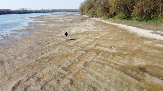problems of drought and aridity in the almost waterless Po river with large expanses of sand and no water - climate change and global warming, Drone view in Ponte bella Becca Pavia Lombardy and Ticino