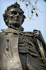 Vertical closeup of the statue of President Abraham Lincoln.