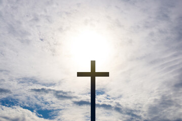 The Cross at the sunrise background