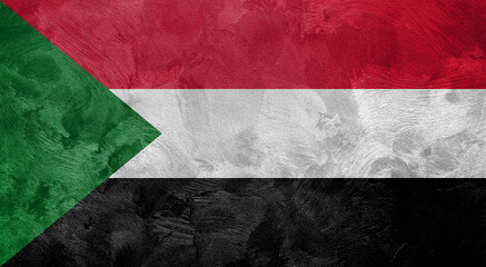 Textured photo of the flag of Sudan.