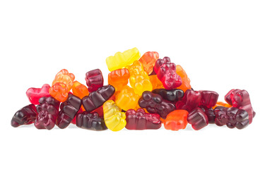 Pile of colorful gummy bears or jelly bears isolated on a white background