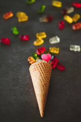 Waffle cone filled with colored jellies