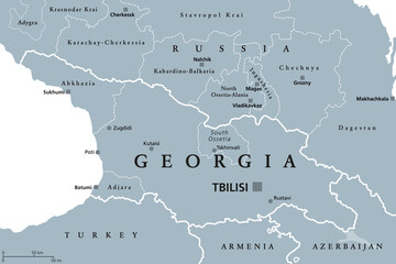Georgia, gray political map, with capital Tbilisi, and international borders. Republic and transcontinental country in Eurasia, located south of North Caucasus Federal District of Russia. Illustration - obrazy, fototapety, plakaty