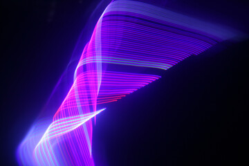 Abstract moving pink and blue neon lights for techno wallpaper or background