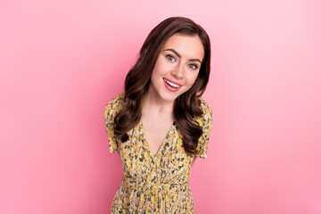Photo of impressed millennial brunette lady look camera wear floral dress isolated on pink color...