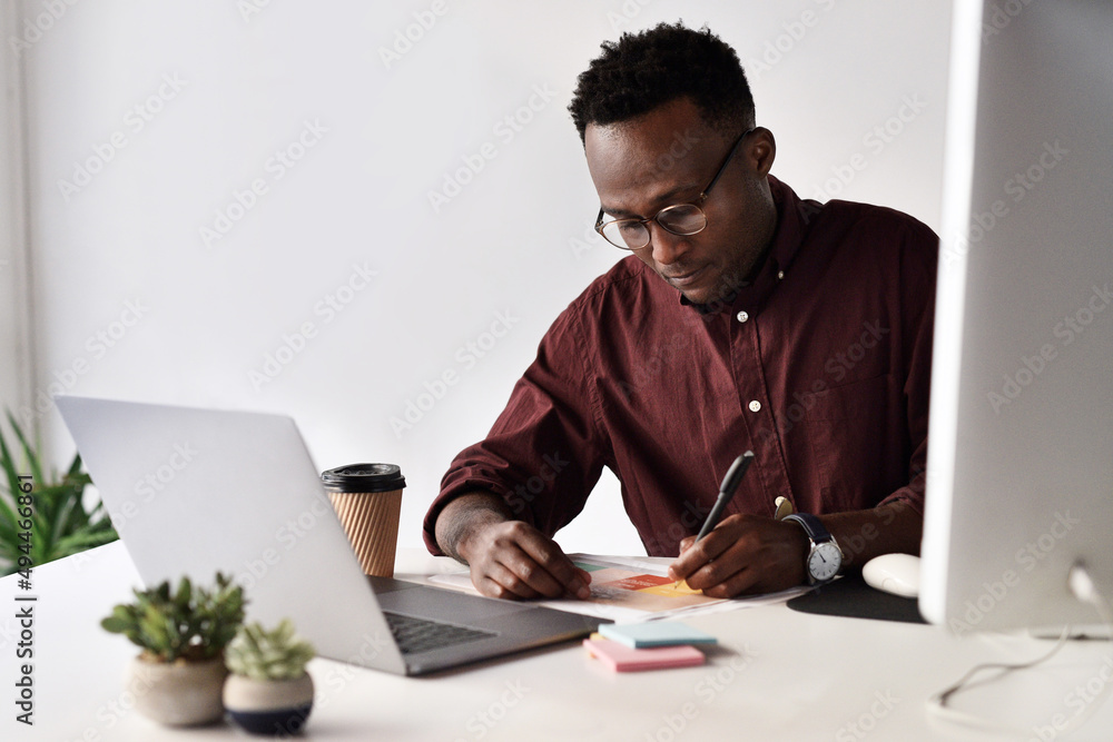 Poster i have to take notes before i forget. cropped shot of a handsome young businessman sitting alone and