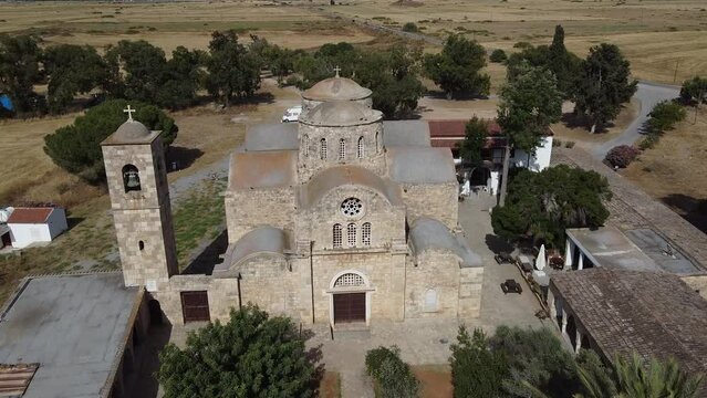 Aerial 4k view of Saint Barnabas Monastery with its surrounding and sea view in Famagusta, North Cyprus