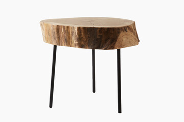 Shot of a three legged stool made of wood trunk and steel isolated on a white background