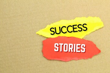 torn yellow and red paper with the words Success Stories