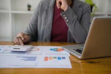 Accountant or banker making calculations Bookkeeper Clerk, Bank Advisor And Auditor. Accounting concept