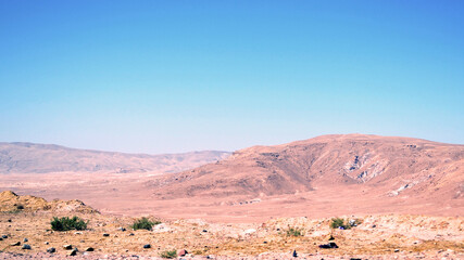 Fototapeta na wymiar Desert mountains on the road to the city of Aqaba